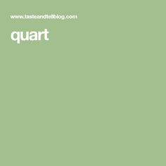 the words quart are written in white on a green background