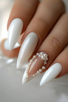 Long Almond white nail designs for bride 2024  Almond and Simple Bow nail designs Wedding Nails For Bride Square, Wedding Nails With Pearls, Wedding Nails Pearl, Wedding Nails Long, Nails With Pearl, Wedding Nail Art, Bridal Nails Designs, Engagement Nails, Wedding Nail