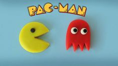 pac - man and pacman made out of play dough on a blue background with pacman's eyes