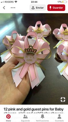 there are pink bows with gold trims on them