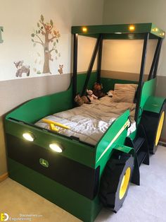 a child's bed made to look like a tractor