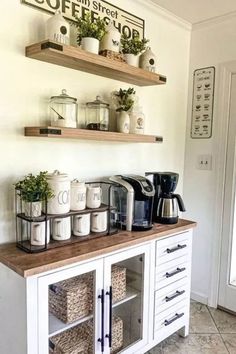 a coffee bar with two shelves above it