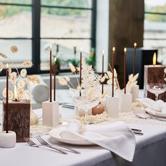 thin brown dinner candles Long Candle Centerpiece, Candles Table Decor, Candle Table Setting, Diningroom Ideas, Taper Candles Wedding, White Tables, Blue Taper Candles, Candle Lit Wedding, Tapered Candle