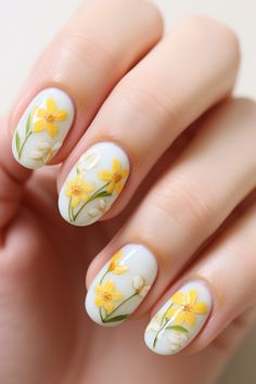 Capture the essence of spring with these lovely daffodil-inspired floral nail designs. Soft white and yellow hues create a serene yet vibrant look. Perfect for adding a subtle touch of nature to your style. Explore more at NailHow.com! Nail Designs Soft, Neon Yellow Nails, Nail Desi, Creative Nail Art, Gel Nails French, Yellow Nail Art, Yellow Nails Design