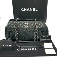 A Chanel Black Iridescent Calfskin Chic Quilted Bowling Style Handbag. This Is A Super Cute Piece From Chanel. The Bowling Bag Style Is Highly Versatile And Easy To Use. Created In Iridescent Calfskin This Bag Will Add A Sparkle To All Your Classic And Creative Looks, Day Or Night. Finished Beautifully With Gunmetal Silver Hardware. Condition: Excellent, Sparingly Used. Designer = Chanel Colour = Black Material = Iridescent Calfskin Style = Chic Quilt Bowling Category = Shoulder Bags Dimensions Chic Quilts, Black Iridescent, Bowling Bag, Bowling Bags, Bag Style, Chanel Black, Style Chic, Silver Hardware, Bowling