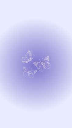 three butterflies flying in the air on a purple background