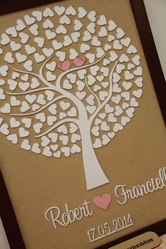 a family tree with two birds on it and hearts in the shape of heart shapes