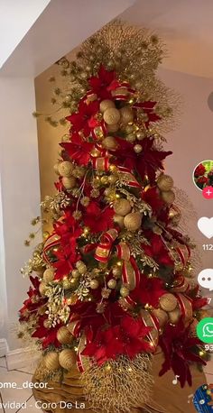 a christmas tree decorated with gold and red ornaments