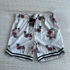 Size Medium, White With Rose Pattern, Basketball Shorts From Aeropostale. Never Worn Before, In Perfect Condition, Just Missing Tags! Trendy White Athletic Shorts For Spring, Trendy White Shorts With Floral Print, Casual Pink Rose Print Bottoms, Trendy White Floral Print Shorts, White Floral Print Summer Shorts, Red Athletic Shorts For Streetwear, Red Streetwear Bottoms With Built-in Shorts, Red Flag Print Shorts, Casual Team-colored Basketball Shorts