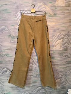 "Baggy Corduroy Pants Corduroy Trousers Boyfriend Pants Brown Sand Corduroy Pants Cowboy style pants Small Size Pants Label size: W32 ; L27 Measurements: (lying flat): Waist: 14\"- 35 cm Hips: 19\"- 48 cm Pant leg inseam: 31,5\" - 80cm Length: 41,5\" - 105 cm Please check measurements to insure a proper fit. Remember to allow yourself some extra room for movement. You can compare these with something from your closet that fits you well. This pants will come to you freshly laundered and ready to Trendy Corduroy Straight Leg Bottoms, Trendy Straight Leg Corduroy Pants, Vintage High Waist Corduroy Pants, High Waist Vintage Corduroy Pants, Vintage High-waist Corduroy Pants, Pantalon Boyfriend, Brown Sand, Pants Corduroy, Boyfriend Pants