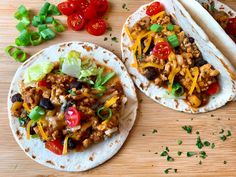 two tortillas filled with meat, cheese and vegetables