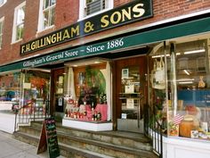 a store front with many items on display in it's windows and the words, edinburgh & sons