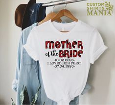 "Customizable Mother Of The Bride I love Her First Shirt, Bride's Mother Shirt,Mom Of Bride Shirt,Wedding Shirt,Bridal Party Shirt,Bride Gift ----- How To Order ----- 1-) Please, check and review all the photos. 2-) Choose your t-shirt size and color. *Different styles of shirts may have different shades of same color choice due to different manufacturer brands. *For this reason, we recommend you to match shirts from the same styles if you want precisely matching colors (ex. Unisex, V-necks, Toddler, etc.). 3-) Click add to cart. You can go back to add more shirts. 4-)Click \"Proceed to check out\". 5-)When you check out, you can add a note to seller for any request. ----- Unisex Shirts ----- * Unisex t shirt fits like a well-loved favorite, featuring a crew neck, short sleeves and designe