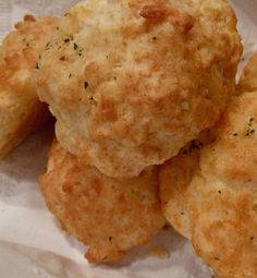 some biscuits that are sitting on wax paper