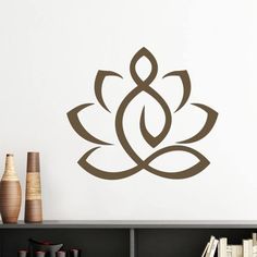 a wall decal with a lotus flower on it's side in brown color