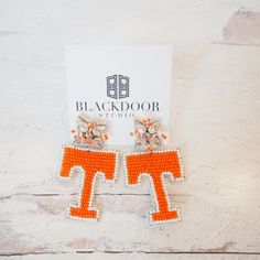 Go All In For The Vols With Our Handmade T Earrings. Post Back And Lightweight. Purse Straps Sold Separately. This Listing Is For One Pair Of T Earrings. Tennessee Vols Football, Vols Football, Tn Vols, Football Earrings, Tennessee Vols, University Of Tennessee, Gameday Outfit, Purse Strap, Girls Earrings