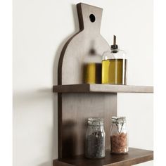 a shelf with some jars and spices on it