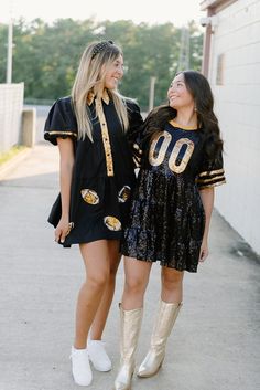 The Black & Gold Jersey Sequin Dress is a dazzling and spirited garment tailored for enthusiastic fans of the New Orleans Saints. This dress is a vibrant celebration of the Saints' iconic black and gold color scheme. The black & gold sequins add a touch of glamour and excitement to the dress, making it a standout choice for game day festivities. model, Jade is wearing a size small Saints Football Outfit Woman, Saints Game Day Outfit, Sequin Jersey, Football Dress, Saints Game, Football Jersey Outfit, Time Clothes, Boutique Trends, Jersey Outfit