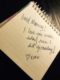 a note that is written on a piece of paper with the words good morning i love you more