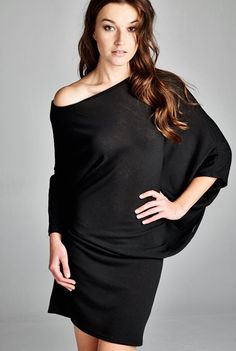 'Perfect Storm' Dress - This sophisticated off the shoulder dress is the perfect storm of sexy meets elegant, meets edgy. Why this is in out Top 10 list of wardrobe staples is because its versatility as both a dress and a long top! With 3/4 dolman sleeves and a boatneck, the tunic can be kept as simply dress. Pull it off one shoulder, add some heels and you have a great date dress. Available in Black. 62% Polyester, 33% Rayon and 5% Spandex. Made in USA. Off-shoulder Bodycon Dresses For Fall, Bodycon Off-shoulder Dress For Going Out, Fall Dressy Dresses For Going Out, Dressy Fall Dresses For Going Out, Dressy Fall Going-out Dresses, Off-shoulder Dress For Going Out In Fall, Casual One Shoulder Maxi Dress For Night Out, Off-shoulder Fall Dress For Going Out, Chic Off-shoulder Stretch Dress