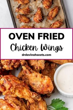 oven fried chicken wings with dipping sauce on the side