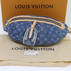 LOUIS VUITTON Monogram Denim High Rise Waist bag Blue M46837 LV Auth ar11395S   BRAND : LOUIS VUITTON    Color : Blue    Material : Monogram Denim Canvas     Size(cm) : W38cm x H16cm x D8cm(Approx)    Size(inch) : W15.0 x H6.3 x D3.1inch(Approx)    Style : Waist bag    Comes with : Dust Bag / Item Box / Name Tag / Shoulder Strap    Serial No. : E0:16:3C:01:A6:46:B7:93    Made in : Italy       This item has been used and may have some minor flaws. Before purchasing, please refer to the images for the exact condition of the item.  We cannot confirm the time period listed.  A return request must be submitted within 48 hours after delivery. Customer is responsible for return shipping costs and fees. Estimated return shipping costs for this item are $80. Contact Our Customer Support for details Designer Handheld Monogram Canvas Shoulder Bag, Designer Monogram Canvas Handheld Shoulder Bag, Designer Shoulder Bag For Daily Use, Designer Flap Shoulder Bag, Designer Handheld Bag With Branded Hardware, Designer Shoulder Bag With Removable Pouch, Designer Everyday Shoulder Bag, Designer Shoulder Bag For Everyday Use, Designer Monogram Canvas Pouch Bag