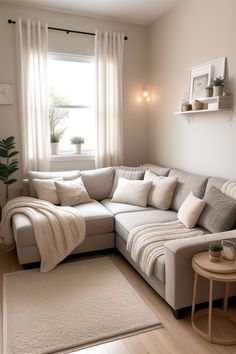 a living room with a large sectional couch and white rug in front of the window