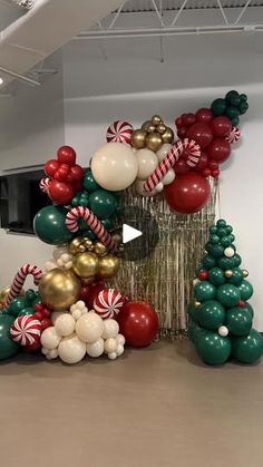 balloons and christmas trees are on display in an office