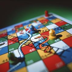 a close up of a board game with pieces on it