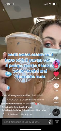 a woman holding up a cup of coffee in front of her face with the caption