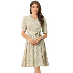 Designed as a lightweight midi option, this cute regular-fit floral dress has a flattering empire line silhouette. Lightweight and flowing, the flared silhouette is decorated in neutral flowers and is trimmed with pretty lace detailing. Pair it with strappy sandals or elegant high heels and add a clutch for a wedding guest look. Occasion: Vacation, Weekend, Gathering, Casual, Beach, Date, Wedding. Modest Knee-length Midi Dress With Ditsy Floral Print, Spring Floral Knee-length Dress For Daywear, Knee-length Floral Dress For Spring Daywear, Spring Knee-length Ditsy Floral Midi Dress, Casual Knee-length Floral Dress For Daywear, Knee-length Ditsy Floral Midi Dress For Garden Party, Flowy Knee-length Midi Dress With Ditsy Floral Print, Flowy Floral Print Knee-length Midi Dress, Feminine Floral Print Knee-length Midi Dress