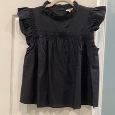 Super Cute Black Boutique Top By Jodifl. Size Medium, This Is Brand New With Tags. Purchased At Local Boutique By Me! Took Home And When I Tried It On I Just Didn’t Like How It Fit Me. Too Late To Return. Also Have A Beautiful Green In The Same Style Listed. Smoke Free Pet Loving Home. Black Ruffle Sleeve Top For Work, Cotton Ruffle Tops For Night Out, Black Summer Tops With Ruffle Sleeves, Black Cotton Ruffle Sleeve Top, Black Ruffle Sleeve Top For Summer, Chic Black Cotton Blouse, Black Cotton Tops With Ruffle Sleeves, Black Ruffled Cotton Blouse, Black Boutique