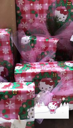 hello kitty presents wrapped in pink and green