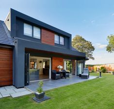 a modern house with an outdoor living area