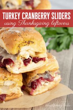 three turkey cranberry sliders stacked on top of each other with text overlay