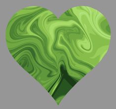 a green heart shaped object on a gray background