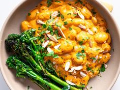 a bowl filled with broccoli and cauliflower