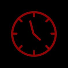 a red clock on a black background with the time at 11 00 pm in the middle