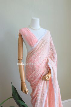 Beautiful Soft Chikaankari Saree in georgette fabric. It's very soft and sits very well on your body. It includes unstitched georgette peach plain blouse. Suitable in any asian occasions. Please message for more informations. Peach Georgette Saree With Unstitched Blouse, Traditional Spring Georgette Pre-draped Saree, Festive Peach Georgette Pre-draped Saree, Peach Blouse Piece With Cutdana Traditional Drape, Peach Dupatta With Unstitched Blouse, Spring Georgette Saree In Traditional Drape, Fitted Peach Georgette Saree, Peach Georgette Blouse Piece With Zari Work, Pink Georgette Blouse With Dupatta