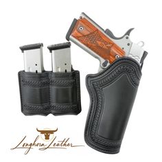 a black leather holster with two silver metal revolvers in it and the word, longhorn leather