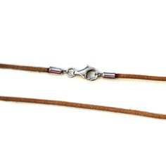 two leather cord with metal clasps on each end, one is brown and the other is silver