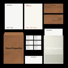 an assortment of stationery items including envelopes, business cards and letterheads