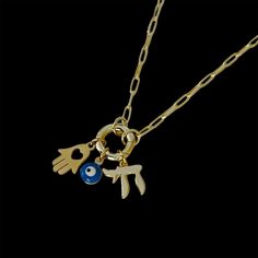 This meaningful necklace features three powerful symbols: the Jewish Chai for life, the Evil Eye for protection, and the Hamsa for blessings and strength. Wear it as a reminder of spiritual security and positive energy, keeping life’s blessings close to your heart. - Metal: Brass.- Plating: Long Lasting 14K Gold Plating. - Chain length: 16" and 2" adjustable. - Pendants Sizes: Aprox. 19 mm long x 10 mm wide (Hamsa), 12 mm x 10 mm (Chai) and 6 mm wide (Evil Eye). - Closure: Lobster Clasp. - Chain Meaningful Necklace, Chain Lengths, Gold Necklace, Gold Plate, Plating, Brass, Chain, 10 Things, Gold