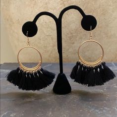 Details Are New Never Worn Brand: Candy Did It! Gold Plated 8 Black Tassels On Each Earring Hook Earrings Very Light Weight They Hang At The Perfect Length Measure Approx 3.5” Long 1.5” Wide Across The Circle In New Condition No Defects One Of My Most Popular Earring Black Fringe Tassel Drop Earrings, Black Dangle Jewelry With Fringe, Black Fringe Dangle Jewelry, Black Tassel Jewelry For Party, Black Fringe Drop Earrings, Black Tassel Party Jewelry, Black Tassel Earrings For Party, Black Fringe Dangle Earrings, Black Fringe Earrings For Party