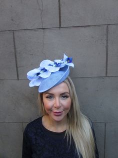 This hat is perfect for special occasions. Featuring light blue artificial orchids on a tilted disc hat. Mounted on a thin headband. The base measures 20cm across. Perfect for races, weddings and special occasions! Made in the UK    Many more items like this are available in our shop! Made in the UK - custom orders are welcome Blue Orchid Flower, Hat Fascinator, January 2025, Artificial Orchids, Headband Wedding, Fascinator Headband, Blue Orchids, Hat Box, Feature Light