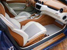 the interior of a sports car is clean and ready to be driven