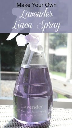 lavender linen spray in a glass bottle on a table with the words how to make your own lavender linen spray