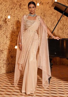 Nidhika Shekhar-Champagne Subh Shree Utsav Sari And Cape Set-INDIASPOPUP.COM Champagne Saree, Saree With Cape, Golden Gown, Cape Set, Embroidered Cape, Eternal Beauty, Drape Saree, Ready To Wear Saree, Indian Wedding Wear