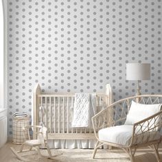 a baby's room with a crib and rocking chair