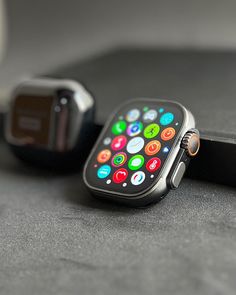 an apple watch sitting on top of a table